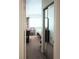 A neat bedroom has neutral tones, natural light, and comfortable space at 6412 Big Pine Way, Las Vegas, NV 89108