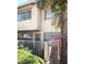 Charming two-story home with secure gated entryway, and well-maintained landscaping at 6412 Big Pine Way, Las Vegas, NV 89108