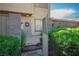 Charming townhome featuring a private gated front entrance and desert landscaping at 6412 Big Pine Way, Las Vegas, NV 89108
