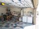 Garage with insulated door and tiled floors, plus washer/dryer hookups at 6412 Big Pine Way, Las Vegas, NV 89108