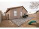 This backyard offers a paved patio, an enclosed fence, and plenty of room to enjoy the outdoors at 652 Carlos Julio Ave, North Las Vegas, NV 89031