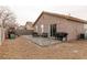 Backyard with a paved patio, seating area, and play equipment offers ample outdoor space at 652 Carlos Julio Ave, North Las Vegas, NV 89031