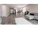 Spacious open layout showcasing a living room with a view of the modern kitchen at 652 Carlos Julio Ave, North Las Vegas, NV 89031
