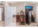 Bedroom view with access to another room and a view of a flat screen television at 6800 E Lake Mead Blvd # 2091, Las Vegas, NV 89156