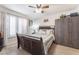 Comfortable bedroom featuring natural light from a large window and ample storage at 6800 E Lake Mead Blvd # 2091, Las Vegas, NV 89156