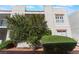 Well-maintained exterior with manicured landscaping, a private balcony, and classic architectural details at 6800 E Lake Mead Blvd # 2091, Las Vegas, NV 89156