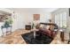 Inviting living room featuring decorative tile flooring, plush sofa, and a cozy fireplace at 6800 E Lake Mead Blvd # 2091, Las Vegas, NV 89156