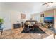 Cozy living room featuring tile flooring, fireplace, plush seating, and natural light at 6800 E Lake Mead Blvd # 2091, Las Vegas, NV 89156