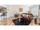 Inviting living room featuring leather sofa, fireplace, tile flooring and lots of natural light at 6800 E Lake Mead Blvd # 2091, Las Vegas, NV 89156