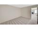 Cozy carpeted bedroom showcasing neutral walls and trim, offering a serene and comfortable living space at 7300 Pirates Cove Rd # 2087, Las Vegas, NV 89145