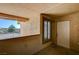 Covered entrance to unit #2087 includes a window and front door with great light at 7300 Pirates Cove Rd # 2087, Las Vegas, NV 89145