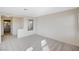 Spacious room includes large window, neutral colored walls, and a doorway to a bedroom at 7300 Pirates Cove Rd # 2087, Las Vegas, NV 89145