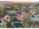 Gorgeous aerial view of a home featuring a private pool, mature trees, and verdant landscaping at 7608 Painted Dunes Dr, Las Vegas, NV 89149