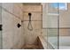 Tiled shower with glass doors and a separate soaking tub with elegant fixtures at 7608 Painted Dunes Dr, Las Vegas, NV 89149