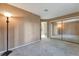 Bedroom featuring sliding closet doors, neutral paint, and carpeted floors at 7608 Painted Dunes Dr, Las Vegas, NV 89149
