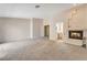 Spacious primary bedroom with fireplace and en suite bathroom at 7608 Painted Dunes Dr, Las Vegas, NV 89149