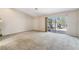 Living room with sliding glass doors leading to an outdoor space at 7608 Painted Dunes Dr, Las Vegas, NV 89149