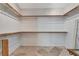 Spacious walk-in closet with multiple rods and shelves at 7608 Painted Dunes Dr, Las Vegas, NV 89149