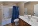 Cozy bathroom featuring a shower-tub combination and wood-style flooring at 7731 Ornamento Way, Las Vegas, NV 89179