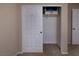 Bedroom closet showing storage with sliding door; carpeted floor at 7731 Ornamento Way, Las Vegas, NV 89179