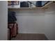 Walk-in closet with carpet, shelving, and clothing at 7731 Ornamento Way, Las Vegas, NV 89179