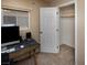 Office closet offering storage space with a wooden rod at 7731 Ornamento Way, Las Vegas, NV 89179