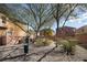 A dog park with native plants that allows neighborhood pets to relieve themselves at 7731 Ornamento Way, Las Vegas, NV 89179