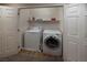 Laundry closet with washer and dryer, offers a practical laundry solution at 7731 Ornamento Way, Las Vegas, NV 89179
