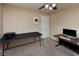 Comfortable office featuring neutral walls, carpet flooring, ceiling fan, and functional furniture at 7731 Ornamento Way, Las Vegas, NV 89179