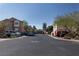 Residential neighborhood featuring diverse architecture, manicured lawns, and street parking at 7731 Ornamento Way, Las Vegas, NV 89179