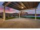 Backyard featuring a patio, pool, putting green, and desert landscaping at 7966 W Ford Ave, Las Vegas, NV 89113
