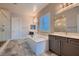 Luxurious bathroom with a soaking tub, walk-in shower, and dual vanities for ultimate comfort at 7966 W Ford Ave, Las Vegas, NV 89113