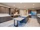 Spacious kitchen features modern appliances, large island, and stylish countertops and cabinets at 7966 W Ford Ave, Las Vegas, NV 89113