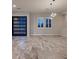 Bright living area featuring recessed lighting, modern lighting fixture, and tile flooring at 7966 W Ford Ave, Las Vegas, NV 89113