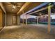 Covered patio with brick flooring, ceiling fan, and view of the backyard with pool at 7966 W Ford Ave, Las Vegas, NV 89113