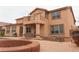 Spacious backyard with a pool, spa, covered patio, and outdoor seating area at 8070 Pavarotti Ave, Las Vegas, NV 89178