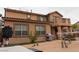 Home backyard featuring covered patio, built-in grill, and outdoor seating area at 8070 Pavarotti Ave, Las Vegas, NV 89178