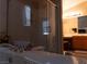 Modern bath with glass shower, soaking tub, and vanity, for a serene experience at 8070 Pavarotti Ave, Las Vegas, NV 89178