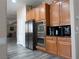 Kitchen showcasing stainless steel appliances and lots of cabinets for storage and wood flooring at 8070 Pavarotti Ave, Las Vegas, NV 89178