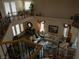 Elegant living room with high ceilings, wrought iron balcony, and lots of natural light at 8070 Pavarotti Ave, Las Vegas, NV 89178