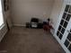 Upstairs bonus room featuring carpet, a window, and a French Door at 8070 Pavarotti Ave, Las Vegas, NV 89178