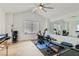 Home gym features updated equipment, hardwood floors, natural light, and a mirrored accent wall at 8324 Slate Harbor Cir, Las Vegas, NV 89128