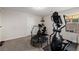 Bright exercise room featuring a stationary bike, trampoline, and elliptical machine at 864 Firestone Ledge Ave, Henderson, NV 89012