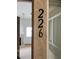 Condo number and corner of a room in the condo showing a fireplace and window at 8725 W Flamingo Rd # 226, Las Vegas, NV 89147