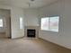 The living room boasts a fireplace and large window for natural light at 8725 W Flamingo Rd # 226, Las Vegas, NV 89147
