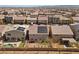 Aerial view showing a neighborhood with well maintained landscaping and solar panels at 9853 Russian Hill St, Las Vegas, NV 89141