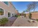 Landscaped backyard featuring synthetic grass at 9853 Russian Hill St, Las Vegas, NV 89141