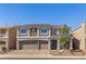 Charming two-story home with a three car garage and stone facade detailing at 9853 Russian Hill St, Las Vegas, NV 89141