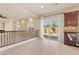 Open living area with tile flooring and sliding door access to the outdoor space at 9853 Russian Hill St, Las Vegas, NV 89141