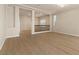 Spacious living room area with modern floors, staircase and plenty of natural light at 9853 Russian Hill St, Las Vegas, NV 89141